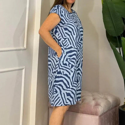 🌸 Sommerlig bohemsk blomsterkjole med rund hals