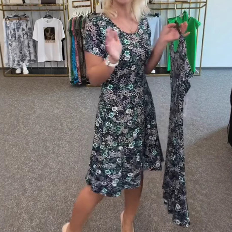 Damekjole med rund hals og blomstertrykk