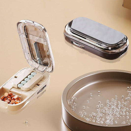 Bärbar pillerburk med skärare