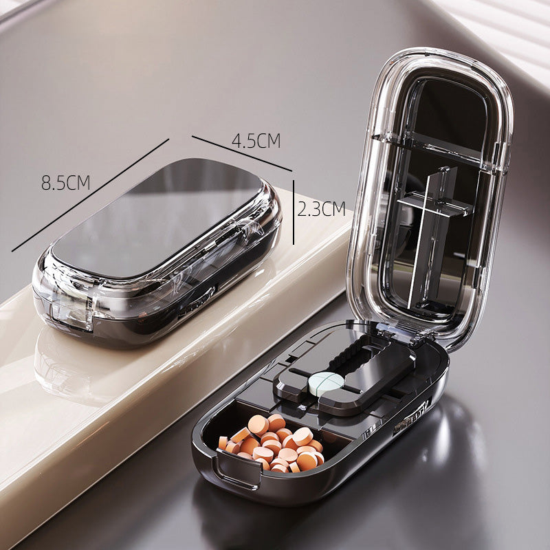 Bärbar pillerburk med skärare